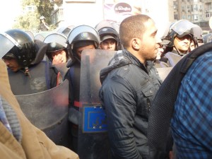 Eventually a car drove up with speakers to serve as a platform for speakers. The police maintained their line, but were left in peace from then on.