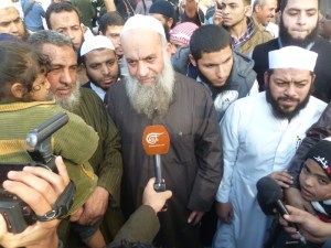 After a little while the star of the show arrived. Mohamed al-Zawahiri is the brother of Ayman, the leader of al-Qaeda. Everyone pressed around him.