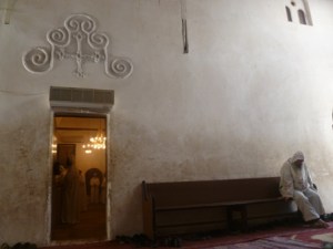 I love this photo. Monks in Egypt are strangely free to join or not join communal worship as they see fit. It is a very individualistic calling, largely left to one's sense of how to walk with God.