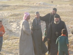 Upon arrival we were met by tens of Muslim women coming out of their homes and cheering. As it turns out, arriving just after us was a released prisoner returning home for the first time in six years. The priests joined in the celebration.