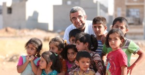 Ehab el-Kharrat visiting refugee children in Erbil, Iraq (credit: SAT-7)