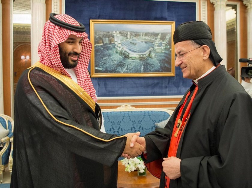 Saudi Crown Prince Mohammed bin Salman shakes hands with Lebanese Maronite Patriarch Bechara Boutros Al-Rahi during their meeting in Riyadh